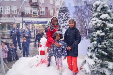 children in a giant snowglobe